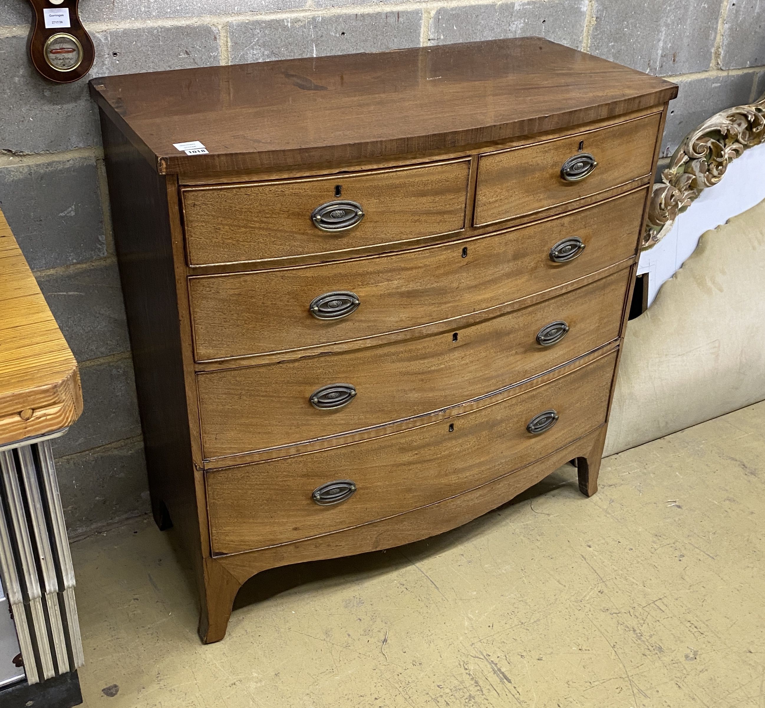 A Regency bow fronted mahogany chest of two short and three long drawers, width 104cm, depth 51cm, height 105cm